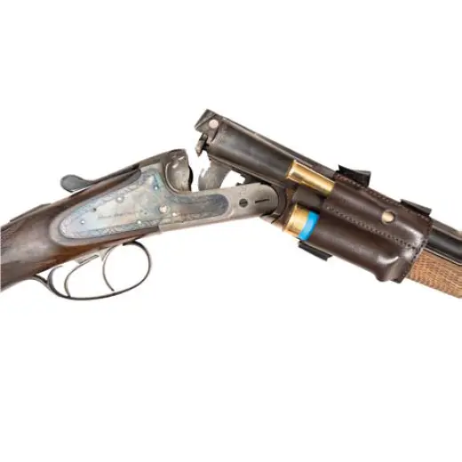 Kožené pouzdro na předpažbí na 1 kulový a 1 brokový náboj. Uchycení pomocí suchého zipu.