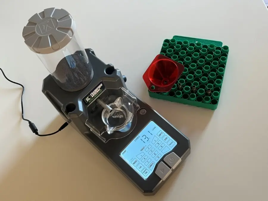 Vážení elektronickým prachovačem