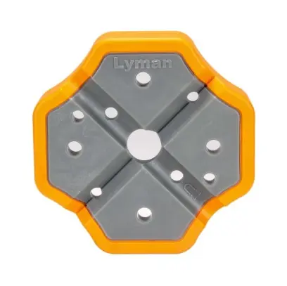 Zbrojířský X-Blok pro bezpečné vytlačování čepů a práci se zbraněmi. Odolný polymer, integrovaný magnet, V-drážka a zaoblená drážka pro stabilní uložení hlavní, závěrů a rámů zbraně.