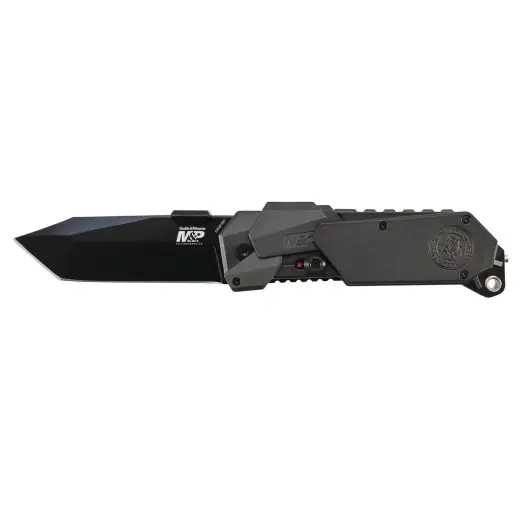 Taktický nůž Smith & Wesson s asistovaným otevíráním, čepelí Tanto z nerezové oceli a hliníkovou rukojetí s pojistkou. Hrot na sklo, kapesní klip a otvor pro provlečení pojistné šňůrky.